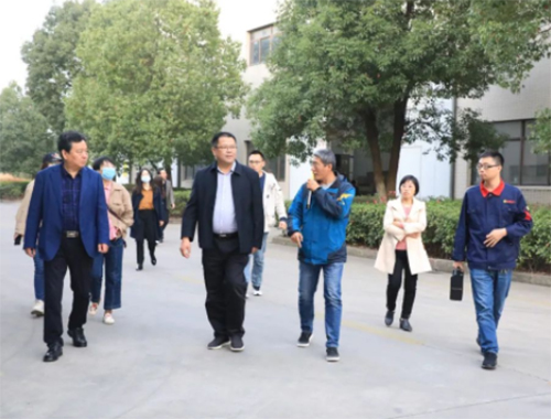 省发改委调研组莅临米兰网web站工厂调研